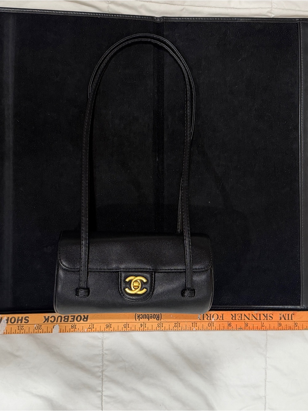 Chanel Preppy Coco Small Bowling Bag in black caviar, with gold hardware.